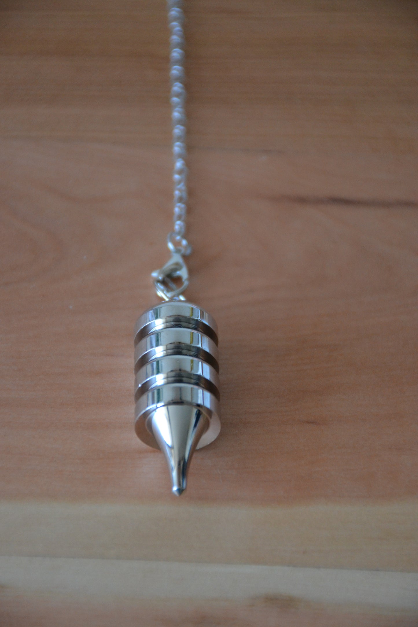 Péndulo Plata