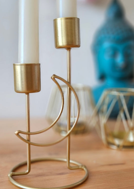 Candelabro dorado para dos velas
