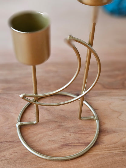 Candelabro dorado para dos velas