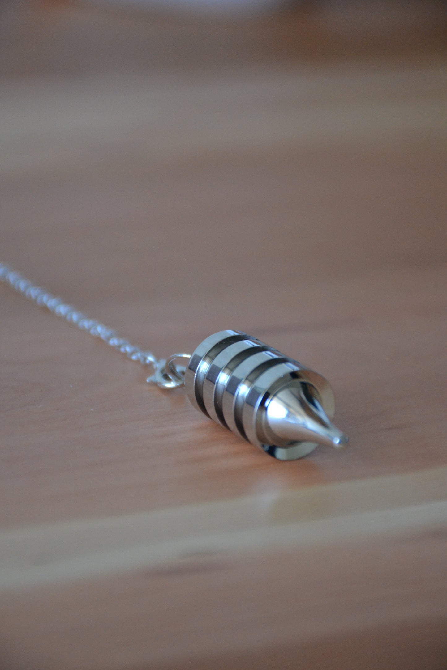 Péndulo Plata