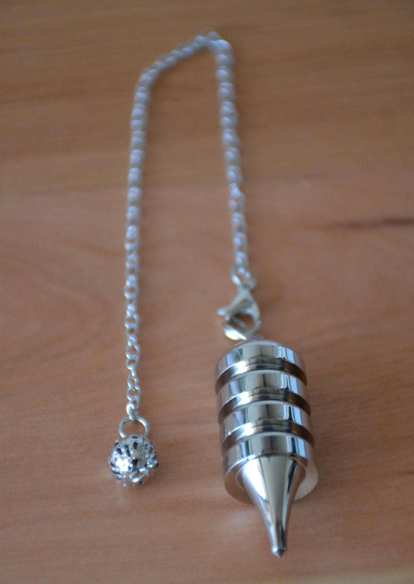 Péndulo Plata